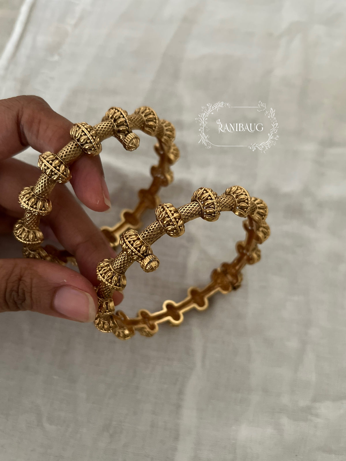 Shravya Unique Design Gold Charm Bangle By Ranibaug