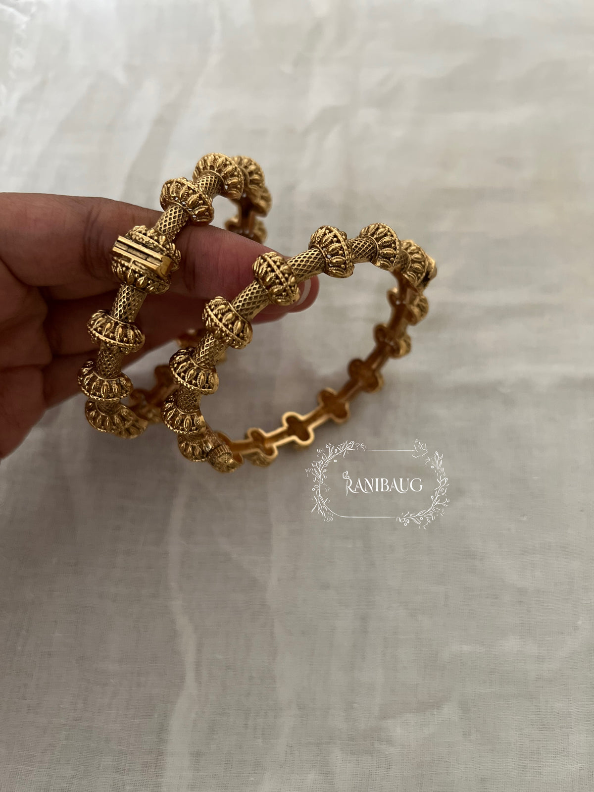 Shravya Unique Design Gold Charm Bangle By Ranibaug