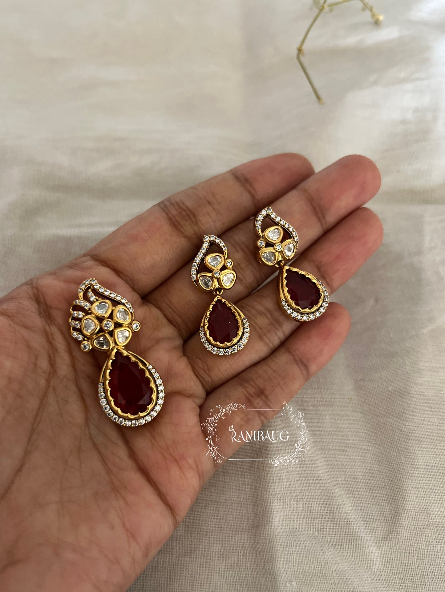 Indraja Red And Green Gold Plated Polki Kundan Pendant Set By Ranibaug | A Designer Jewelry Piece
