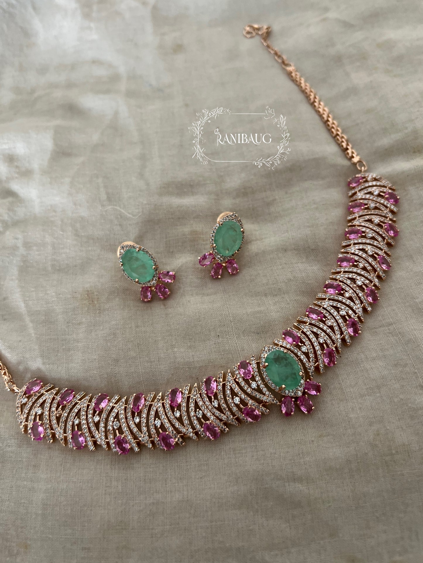Jigya Mint Pink Stones Gold Finish Diamond Designer Necklace Set By Ranibaug