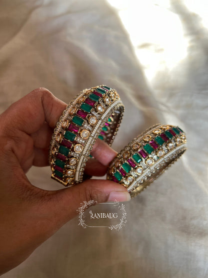 Kairavi Emerald Ruby Stones Polki Studded Gold Finish Pearl Adorned Broad Statement Kada Bangles By Ranibaug