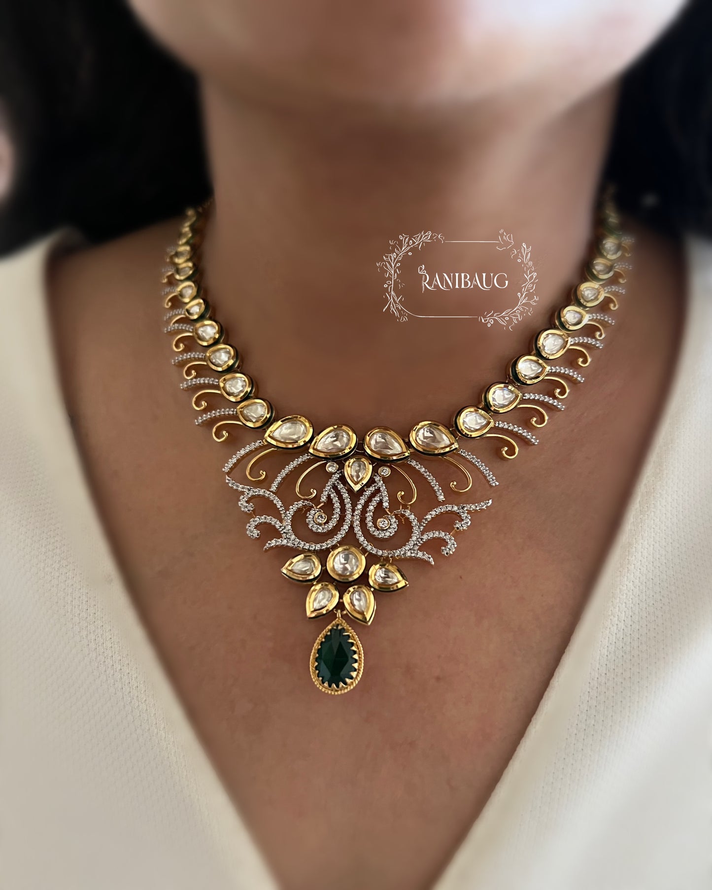 Kanika Emerald Teardrop Motif Polki And Diamond Studded Rich Gold Finish Designer Necklace Set By Ranibaug
