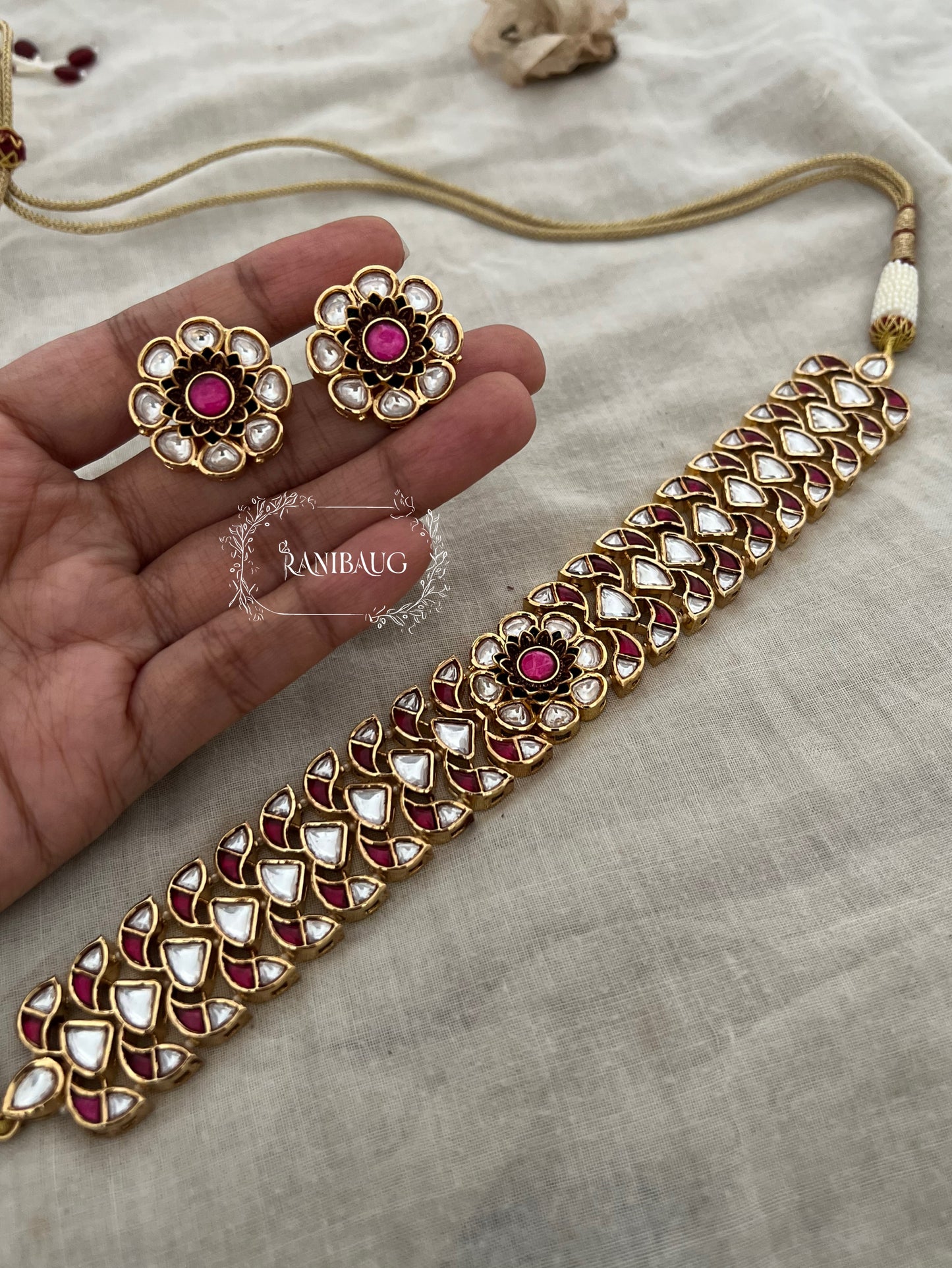 Kanika Flower Design Featuring In Premium Mossainite Kundan And Rich Gold Finish Choker Necklace Set With Flower Stud Earrings By Ranibaug