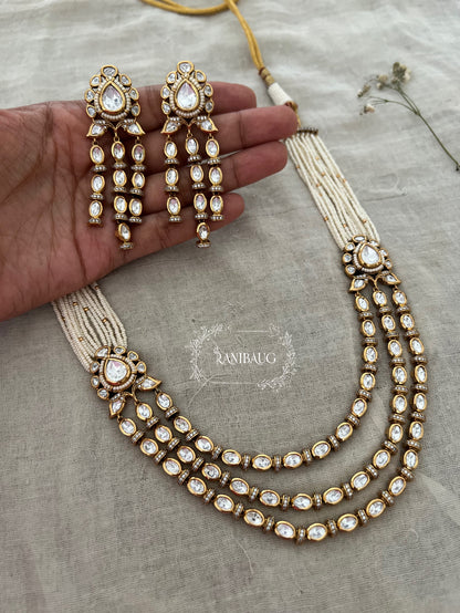 Kartika Gold Finish Polki Kundan Studded Pearl Strand 3 Layered Necklace With Long Earrings By Ranibaug