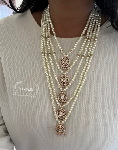 Kaveri Rich Creamy Pearl Adorned Five Layered Polki Motifs Necklace Set By Ranibaug