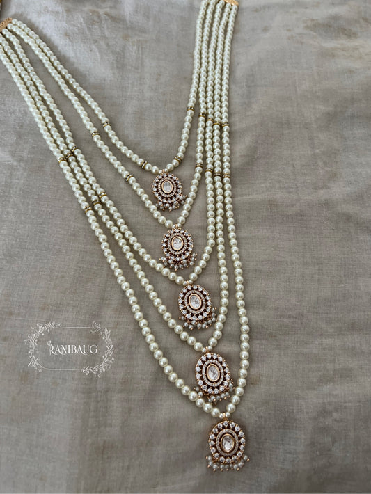 Kaveri Rich Creamy Pearl Adorned Five Layered Polki Motifs Necklace Set By Ranibaug