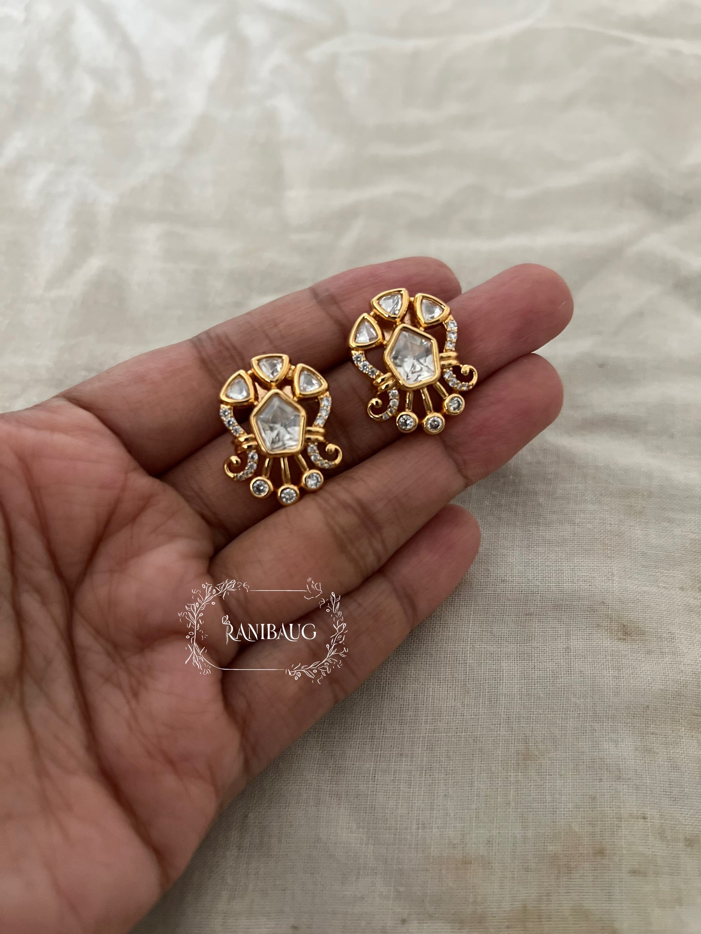 Kavira Rich Gold Finish Polki Studded Festive Ear Studs By Ranibaug