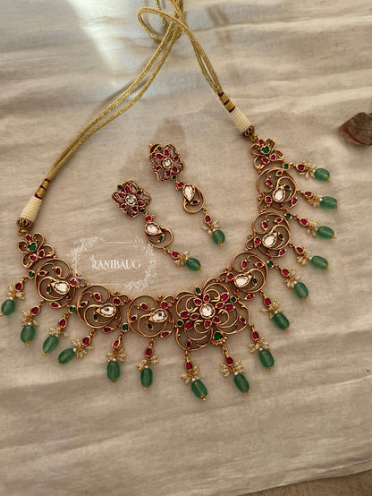 Keerthi Gold Intricate Design Work Polki Studded Beaded Tassel Heritage Necklace Set By Ranibaug