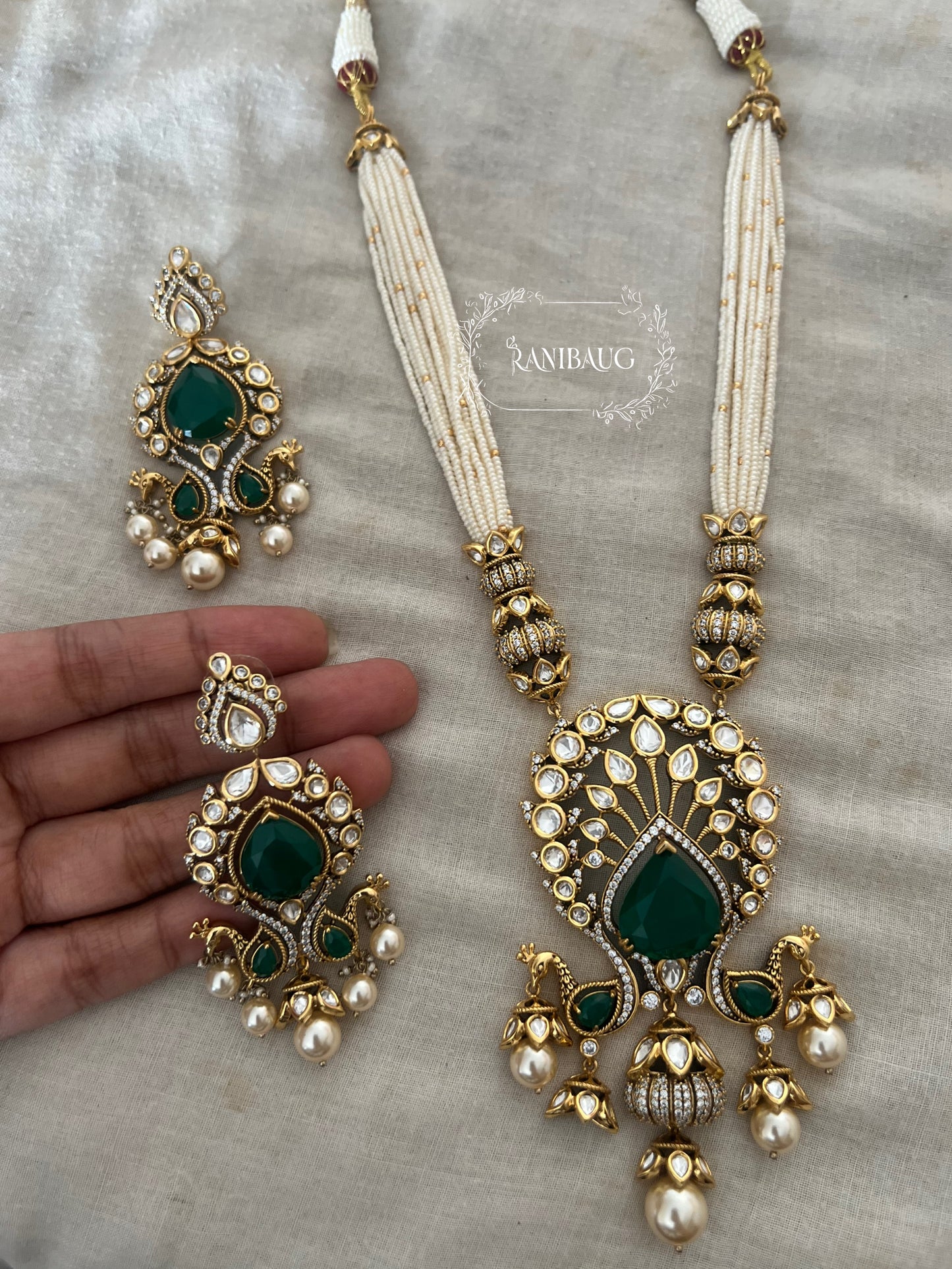 Kiran Royal Mossainite Polki Studded In Rich Gold Finish Necklace Jewellery Set Adorned In Pearls By Ranibaug