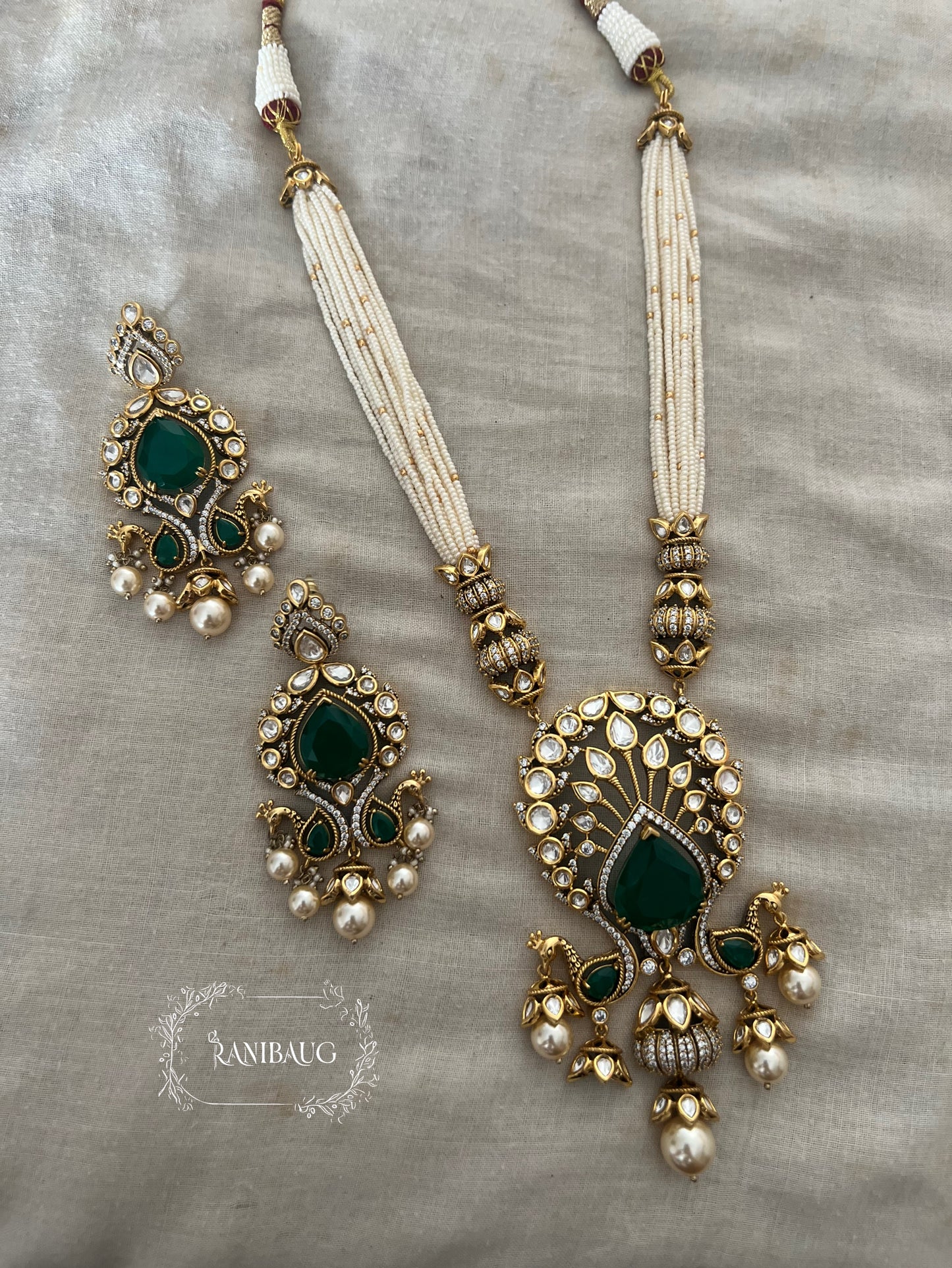 Kiran Royal Mossainite Polki Studded In Rich Gold Finish Necklace Jewellery Set Adorned In Pearls By Ranibaug