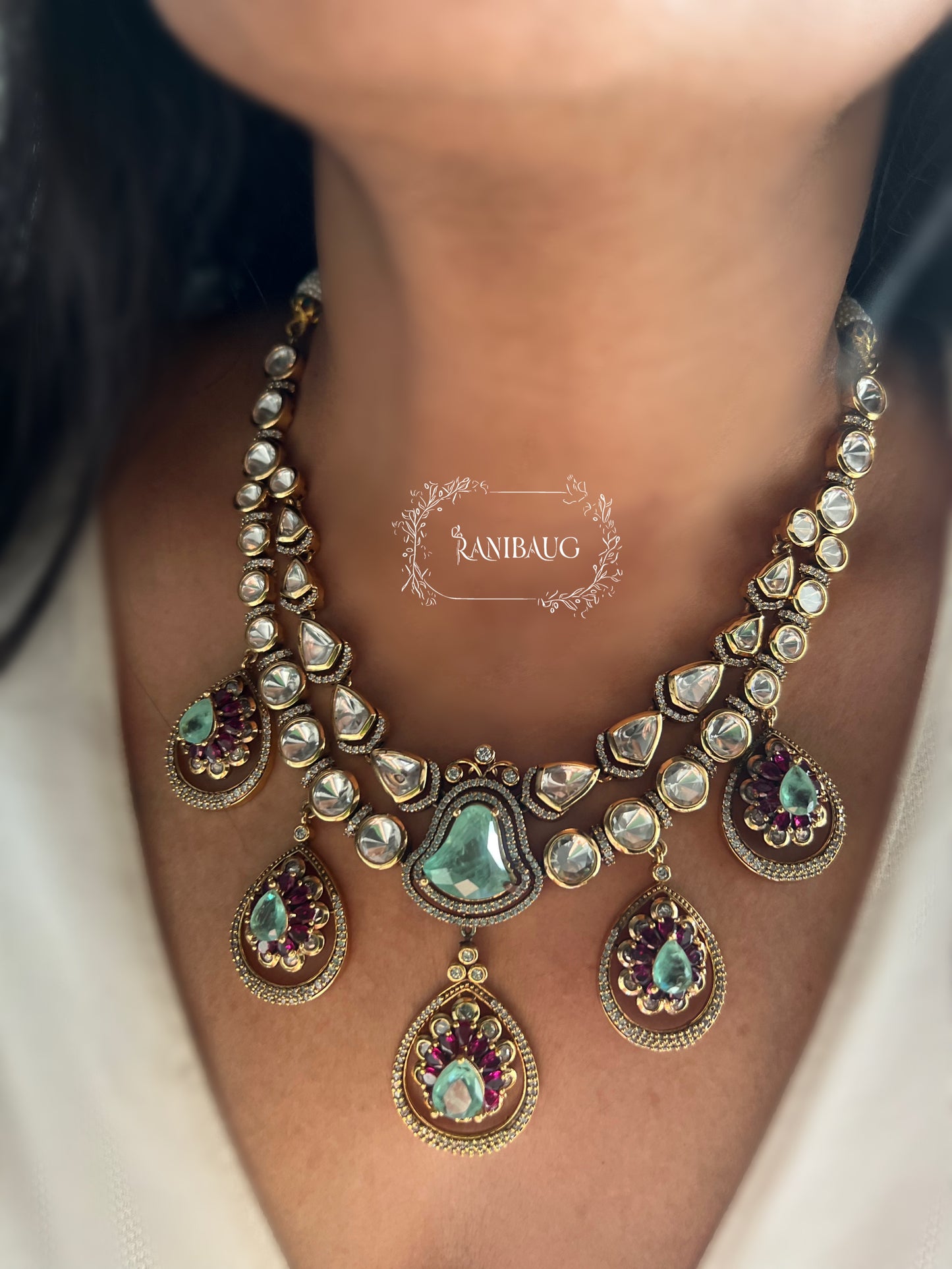 Kiyana Polki Gemstone Adorned Teardrop Dangle Motifs Layered Royal Necklace With Maang Tikka By Ranibaug
