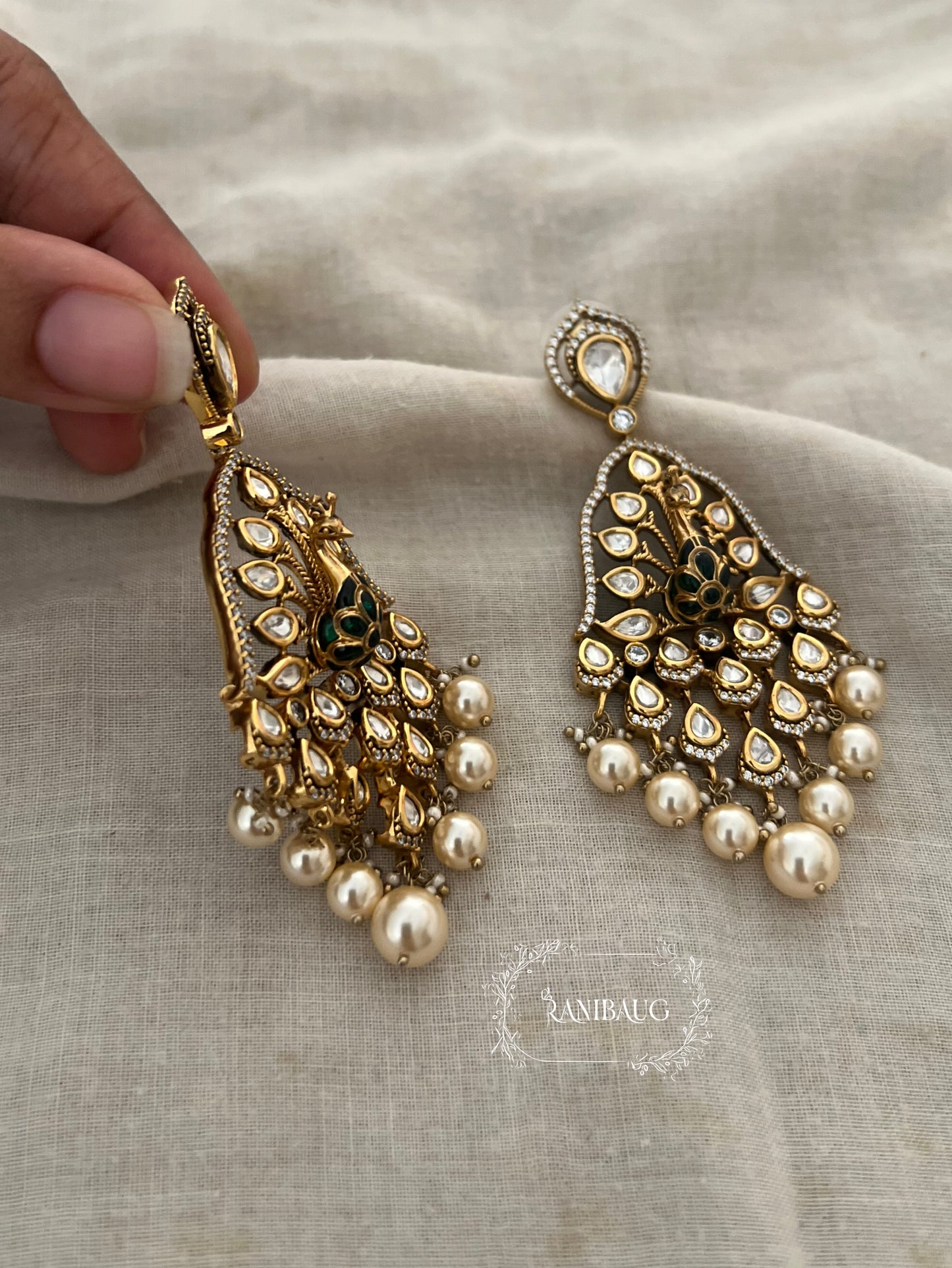 Kripa Kundan Studded Peacock Chandbali Pearl Drop Earrings By Ranibaug