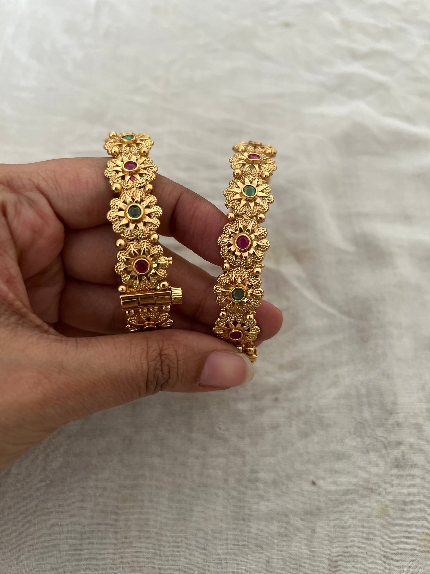 Krithi Bangles Simple Floral Motif In Rich Gold Finish By Ranibaug