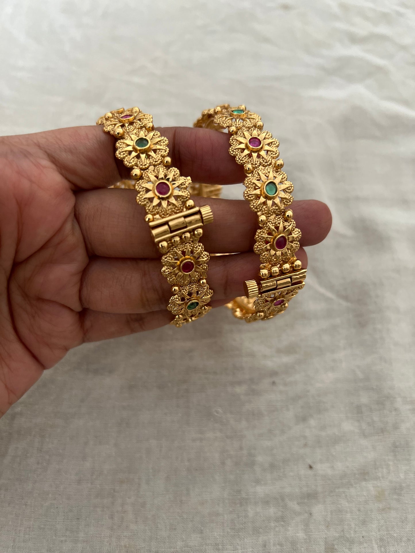 Krithi Bangles Simple Floral Motif In Rich Gold Finish By Ranibaug