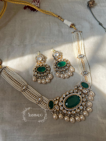 Labhi Gold Finish Polki Kundan And Pearl Necklace With Emerald Center Stone By Ranibaug