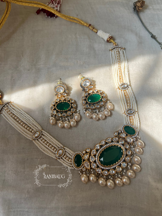 Labhi Gold Finish Polki Kundan And Pearl Necklace With Emerald Center Stone By Ranibaug