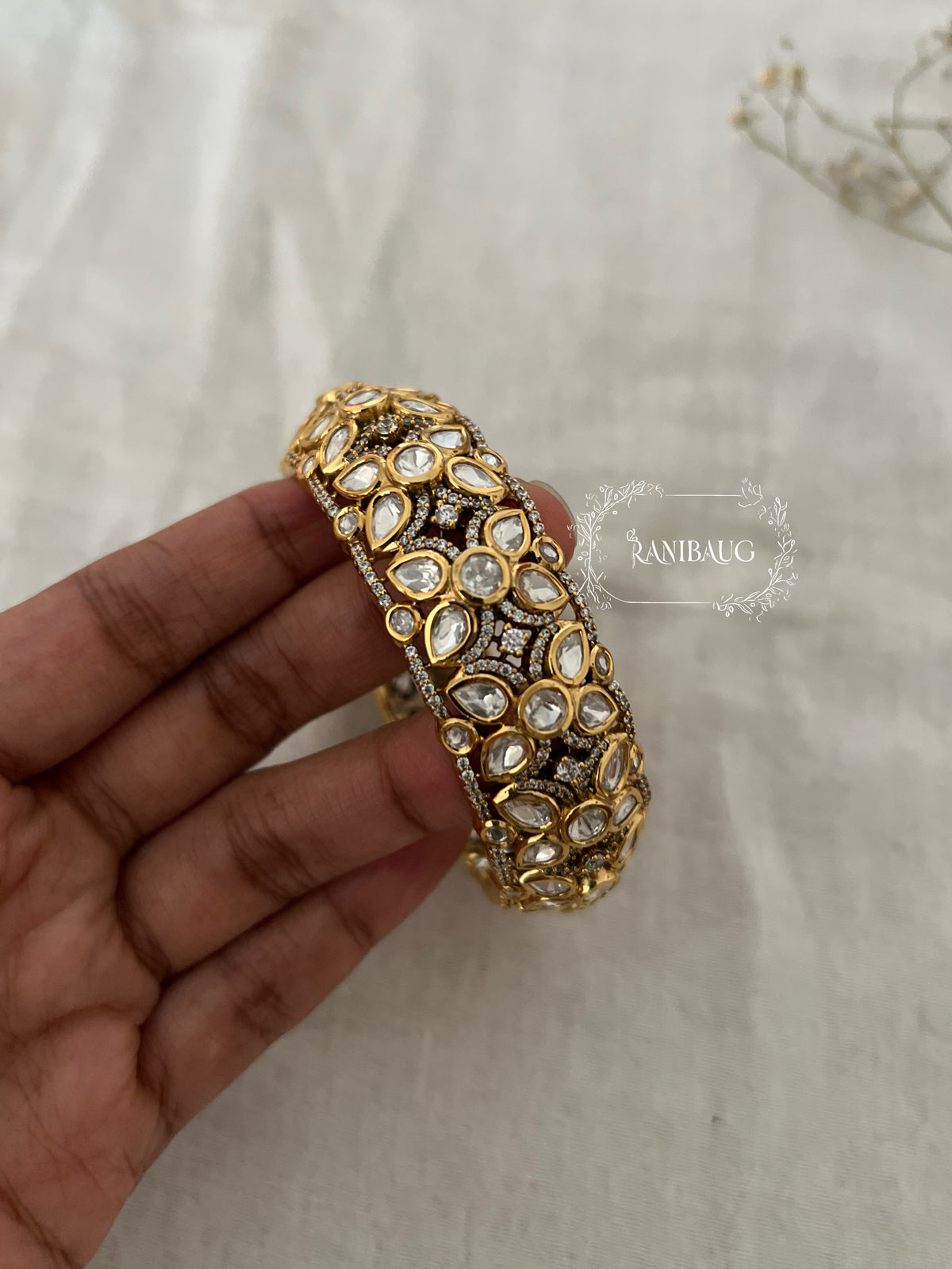 Maan Kundan Floral Motif Gold Finish Statement Bangle By Ranibaug