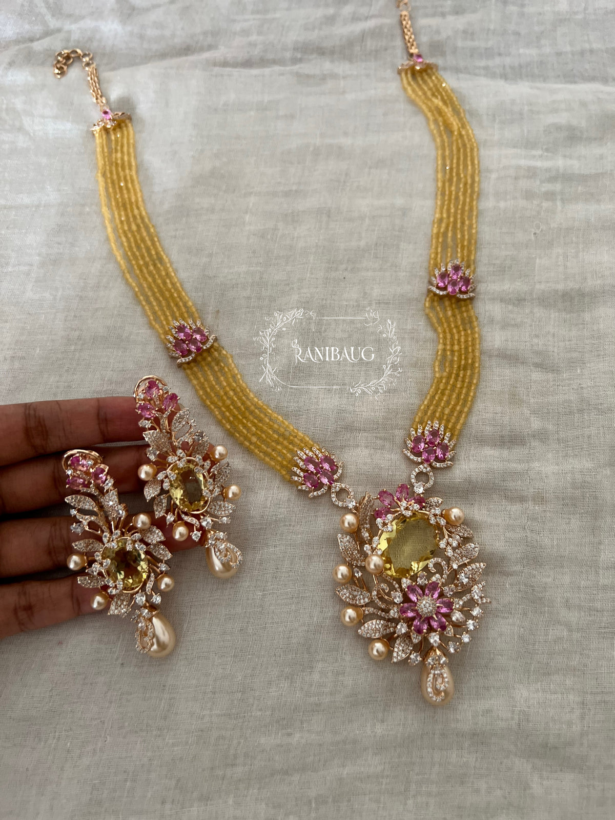 Maitrika Amber Yellow Gold Finish Floral Diamond Motif Beaded Necklace Set By Ranibaug