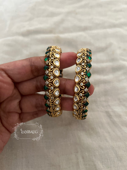 Manali Polki Kundan Studded Gold Plated Festive Bangles In Emerald Green And Ruby Stones By Ranibaug