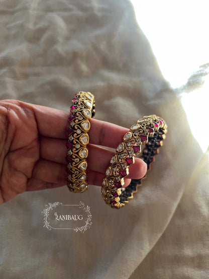 Manali Polki Kundan Studded Gold Plated Festive Bangles In Emerald Green And Ruby Stones By Ranibaug