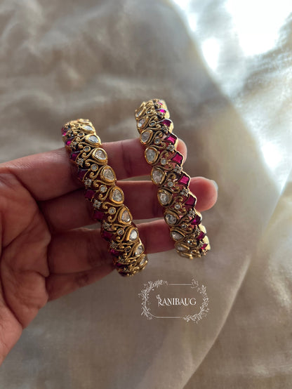 Manali Polki Kundan Studded Gold Plated Festive Bangles In Emerald Green And Ruby Stones By Ranibaug