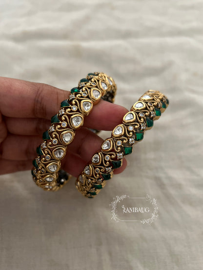 Manali Polki Kundan Studded Gold Plated Festive Bangles In Emerald Green And Ruby Stones By Ranibaug