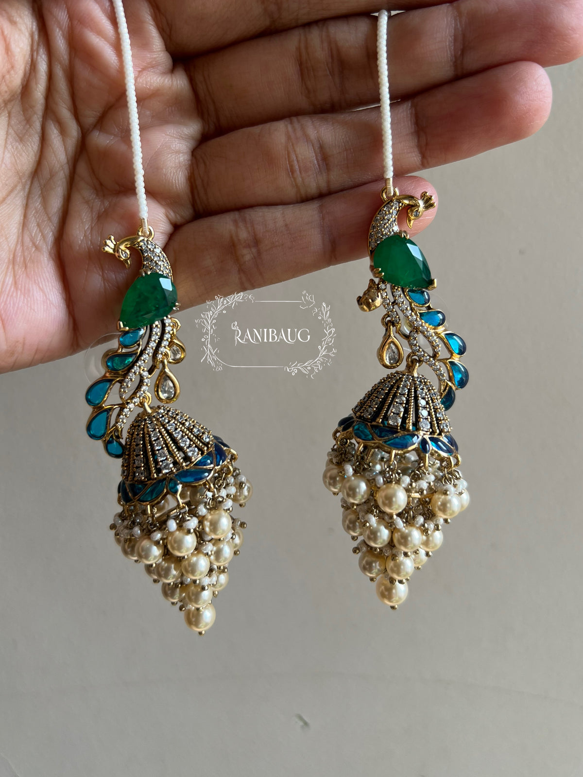 Manasvi Kundan Polki Peacock Motif Designer Royal Statement Earrings With Seed Pearl Hair Chain By Ranibaug