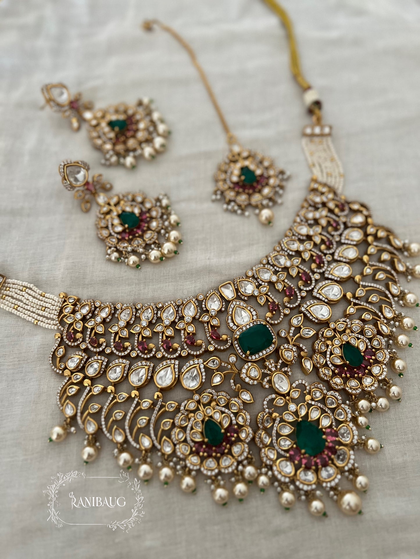 Manjishta Rich Gold Finish Polki Kundan Adorned Layered Pearl Complete Bridal Jewellery Necklace Set By Ranibaug | The Royal Wedding Collection 2026