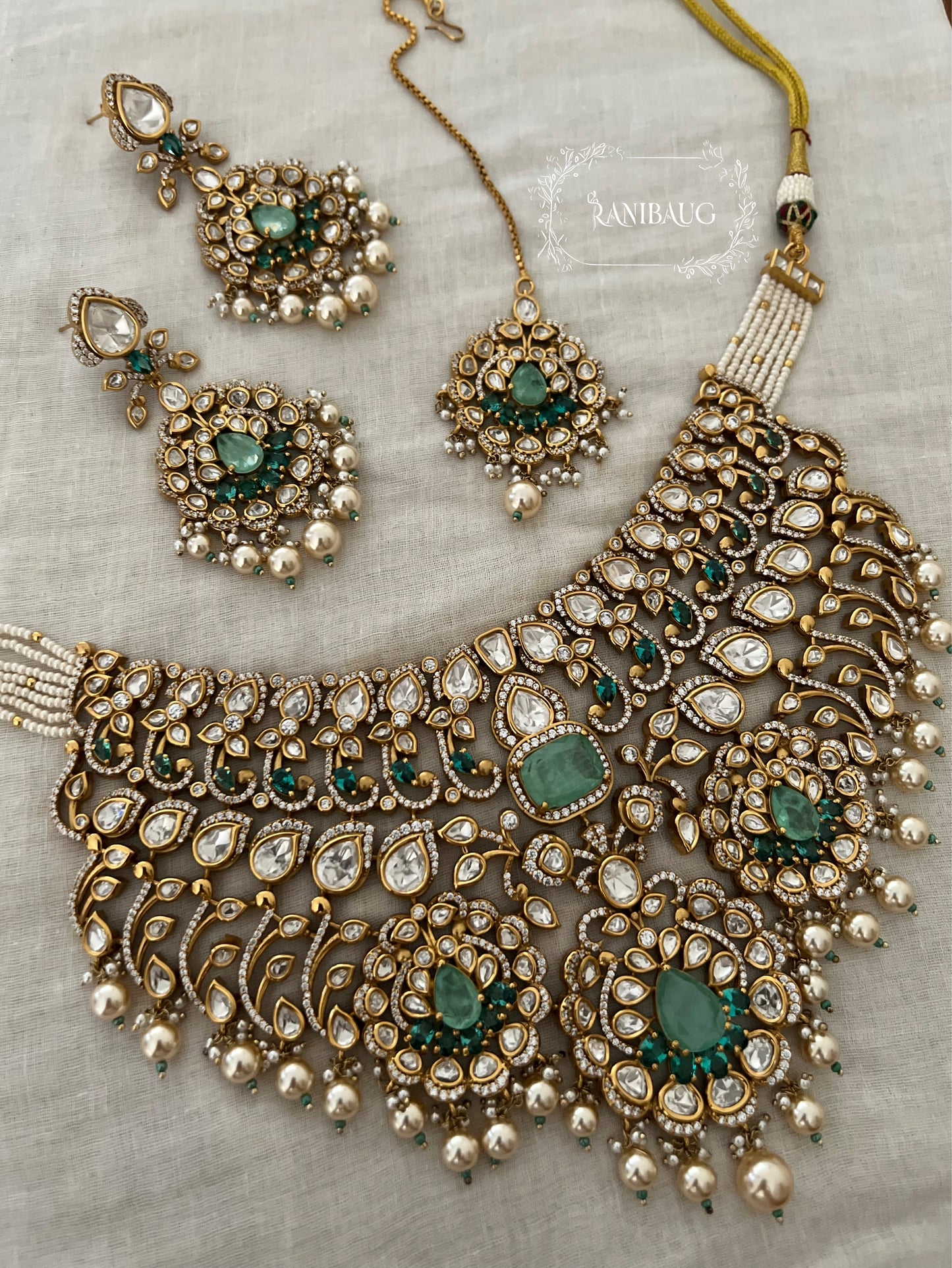 Manjishta Rich Gold Finish Polki Kundan Adorned Layered Pearl Complete Bridal Jewellery Necklace Set By Ranibaug | The Royal Wedding Collection 2026