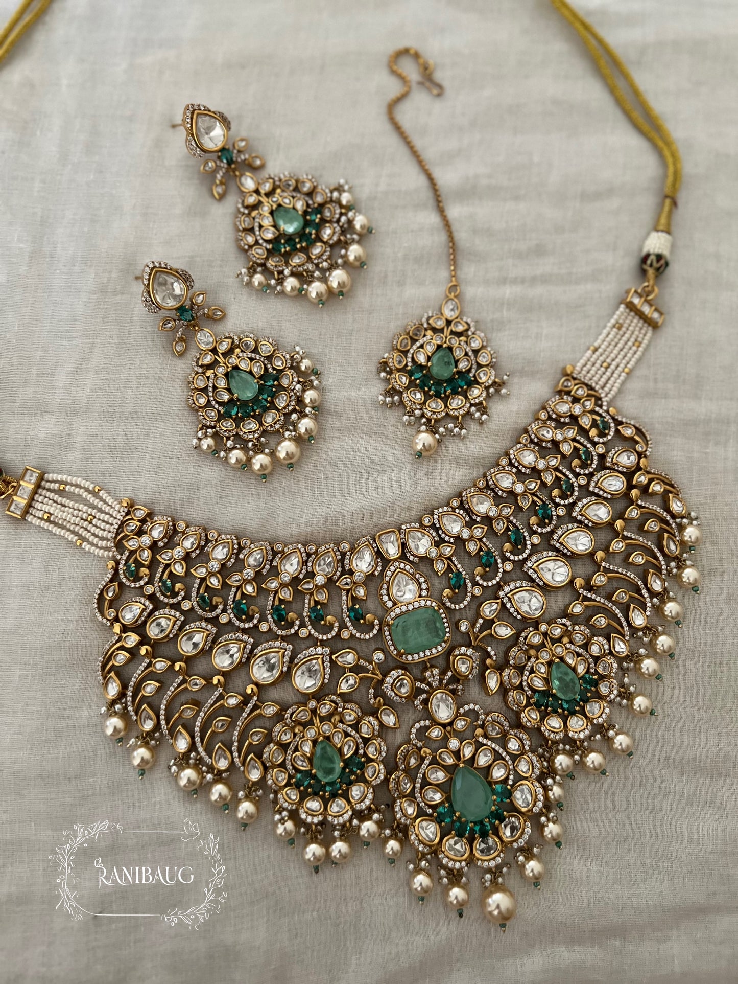 Manjishta Rich Gold Finish Polki Kundan Adorned Layered Pearl Complete Bridal Jewellery Necklace Set By Ranibaug | The Royal Wedding Collection 2026