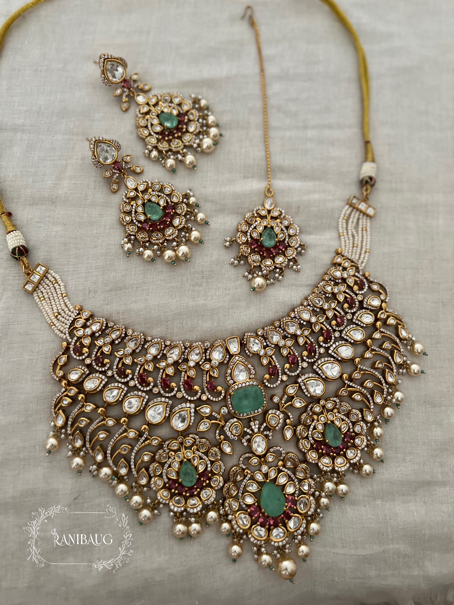Manjishta Rich Gold Finish Polki Kundan Adorned Layered Pearl Complete Bridal Jewellery Necklace Set By Ranibaug | The Royal Wedding Collection 2026