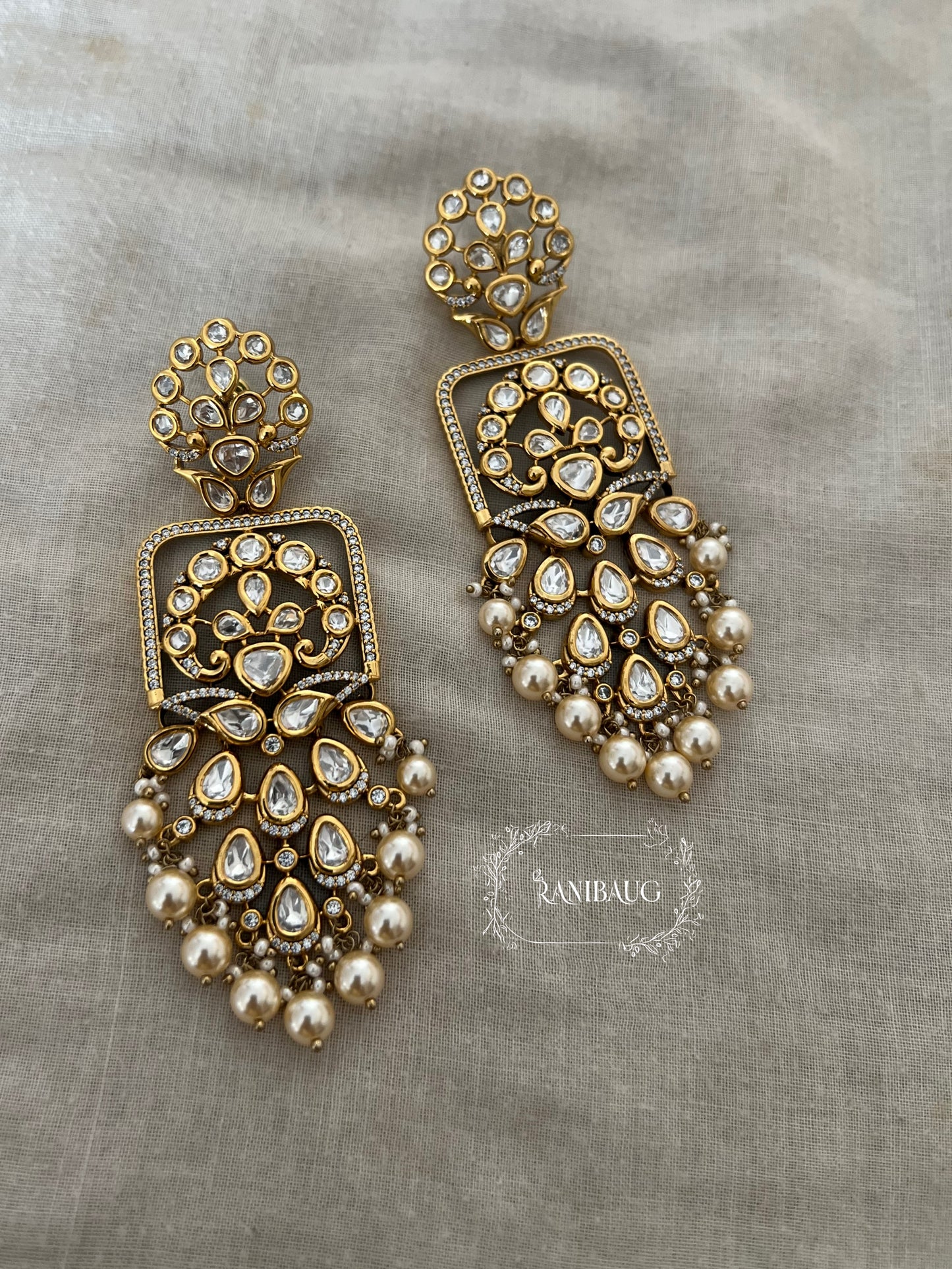 Maya Royal Statement Bridal Premium Gold Finish Mossainite And Pearl Earrings By Ranibaug