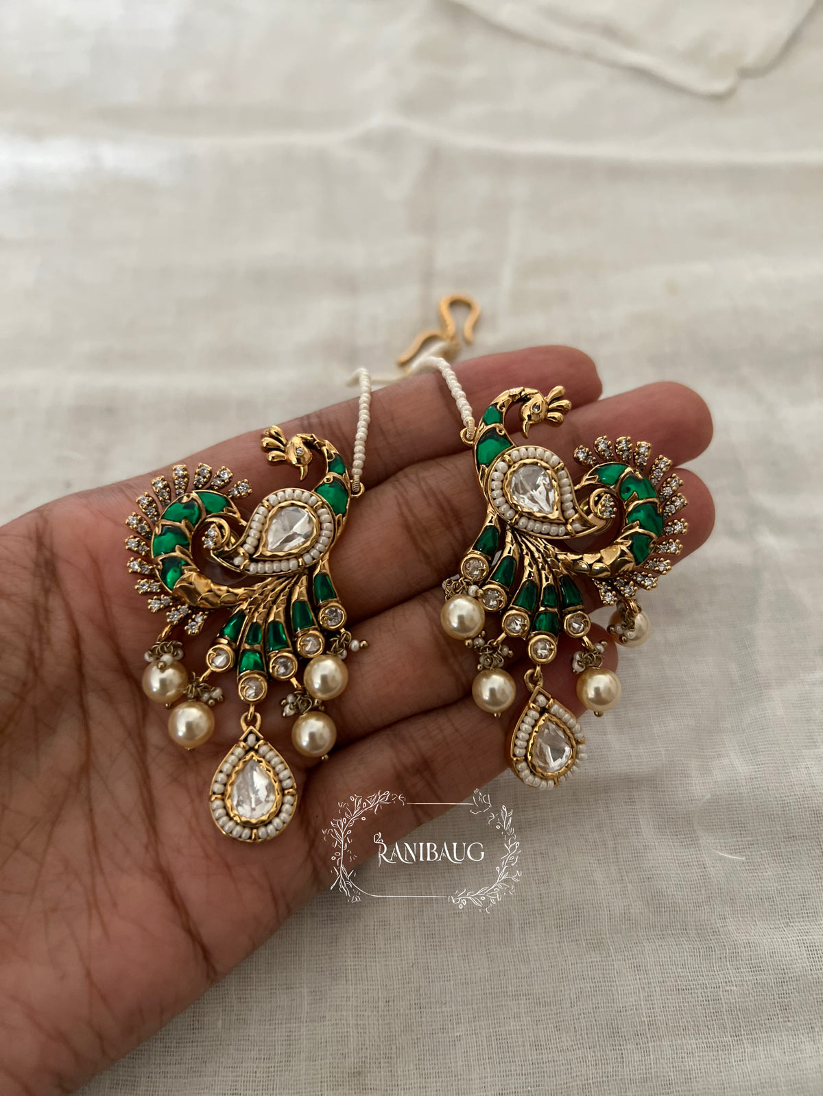 Mayavi Peacock Polki Pearl Adorned Gold Finish Designer Hair Chain Earrings By Ranibaug