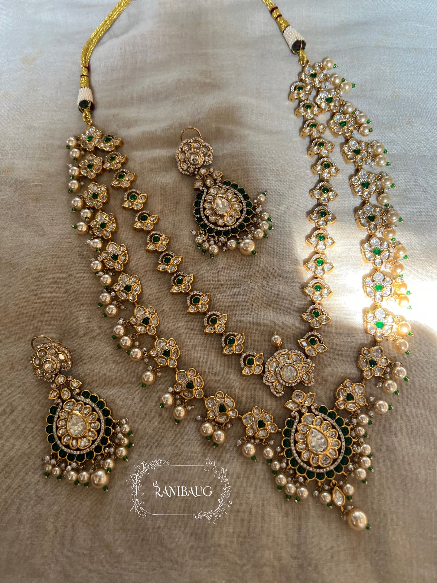 Mayera Layered Gold Plated Traditional Style Wedding Necklace Jewellery Set With Earrings And Maang Tikka By Ranibaug