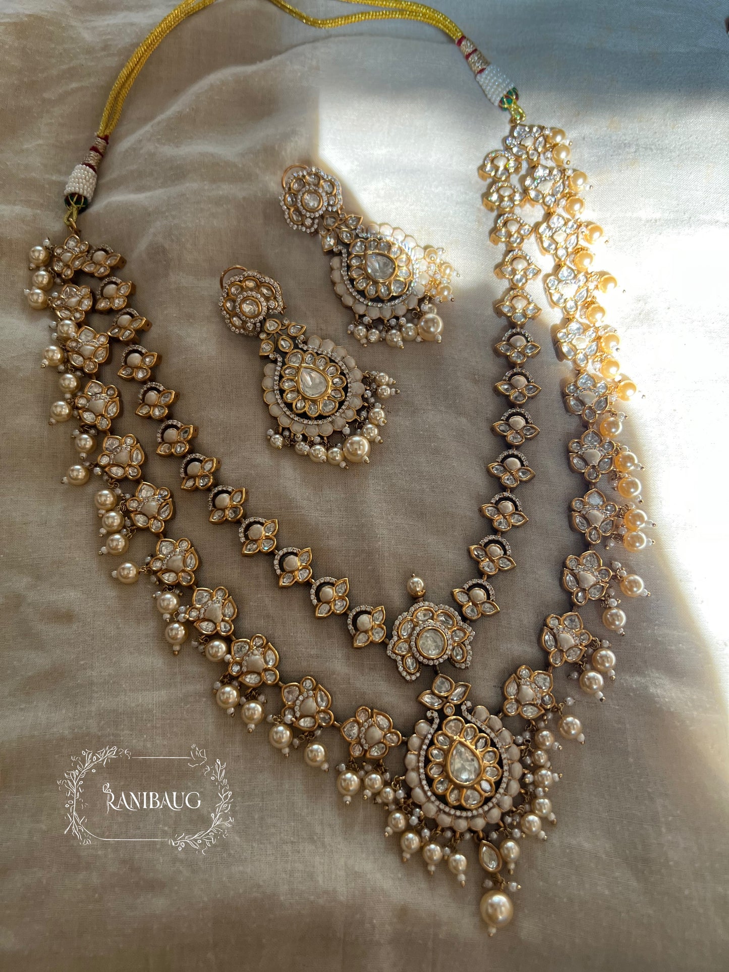 Mayera Layered Gold Plated Traditional Style Wedding Necklace Jewellery Set With Earrings And Maang Tikka By Ranibaug