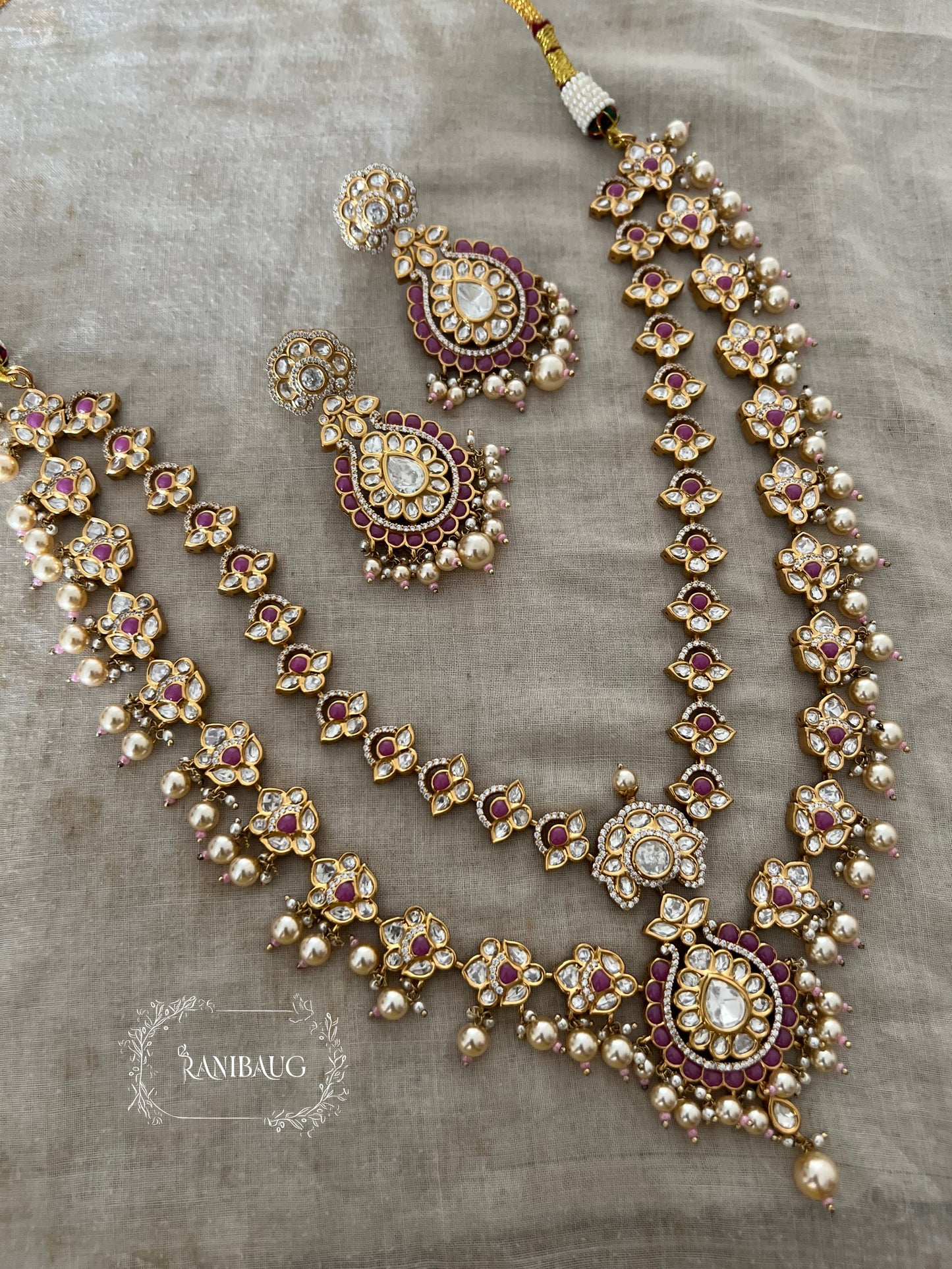 Mayera Layered Gold Plated Traditional Style Wedding Necklace Jewellery Set With Earrings And Maang Tikka By Ranibaug