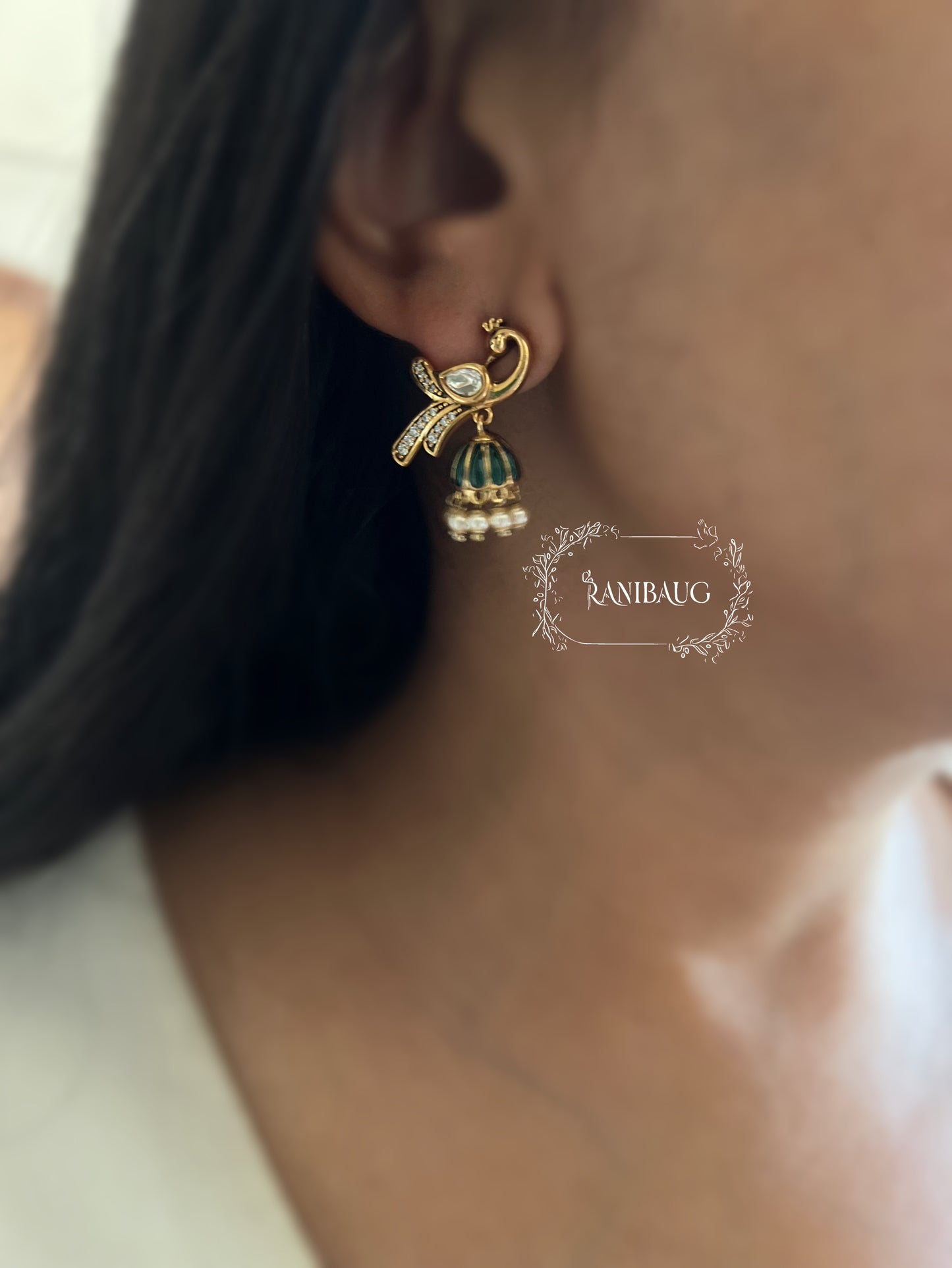 Mayra Peacock Motif Polki Pearl Studded Enamel Zirconia Adorned Premium Gold Plated Ear Studs Jewelry By Ranibaug