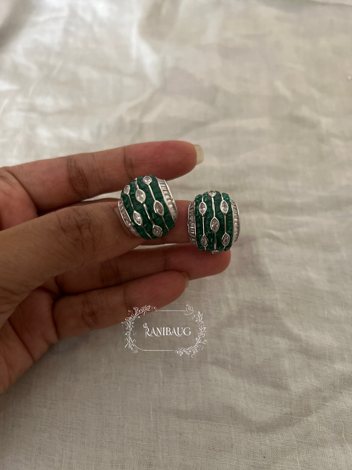 Mehera Arc Huggie Diamond Ear Studs In Different Colors By Ranibaug