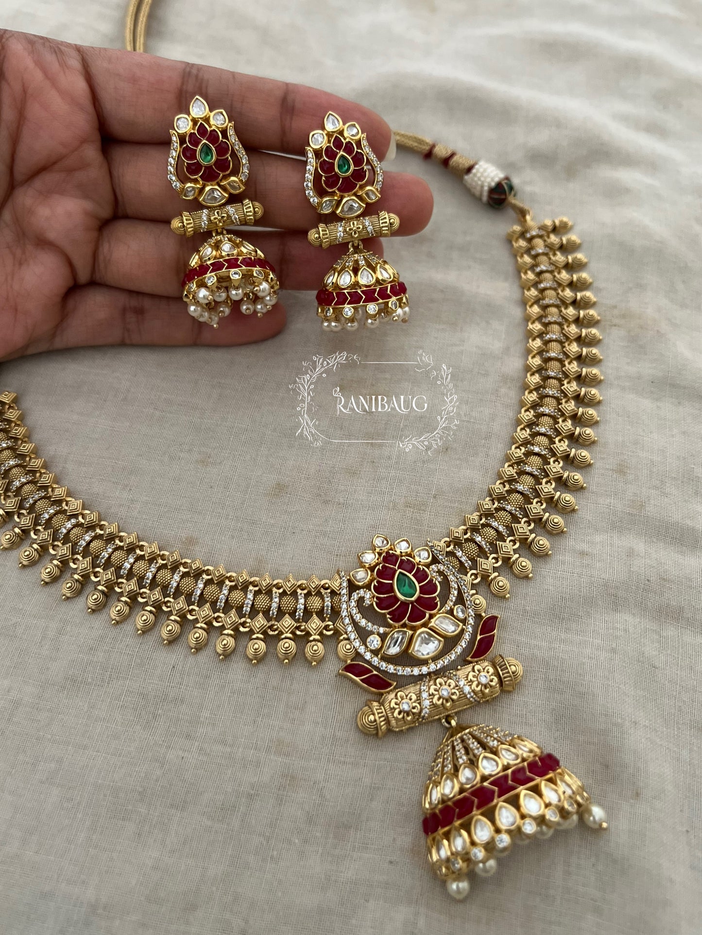 Mehrasa Ruby Rich Gold Finish Polki Pearl Adorned Jharokha Heritage Choker Set By Ranibaug
