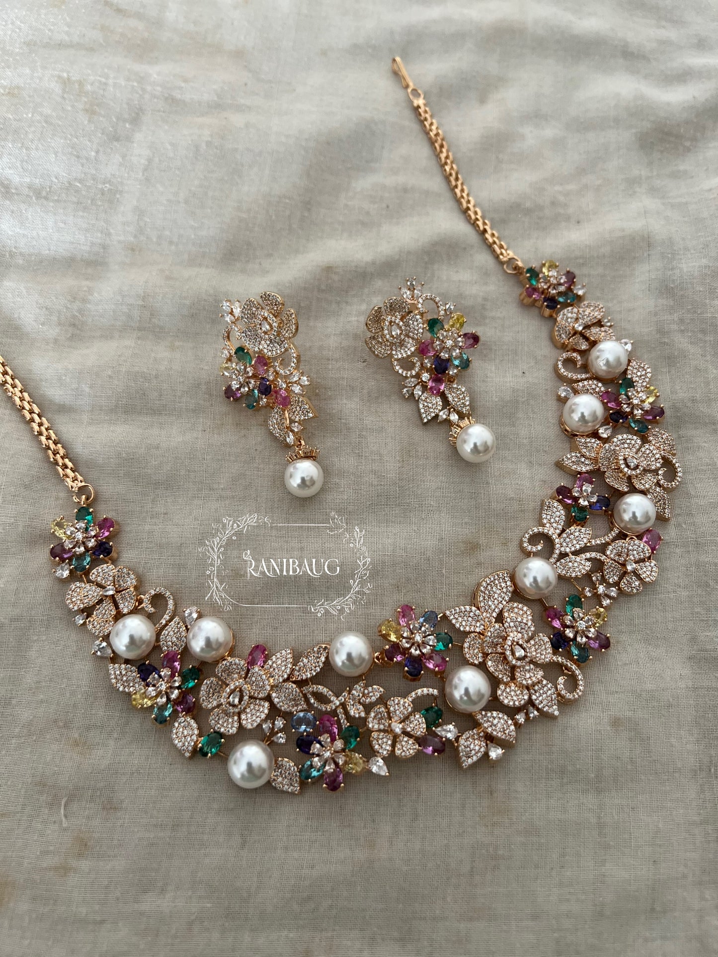 Mika Floral Multicolor Stones Diamond Pearl Adorned Necklace Set By Ranibaug
