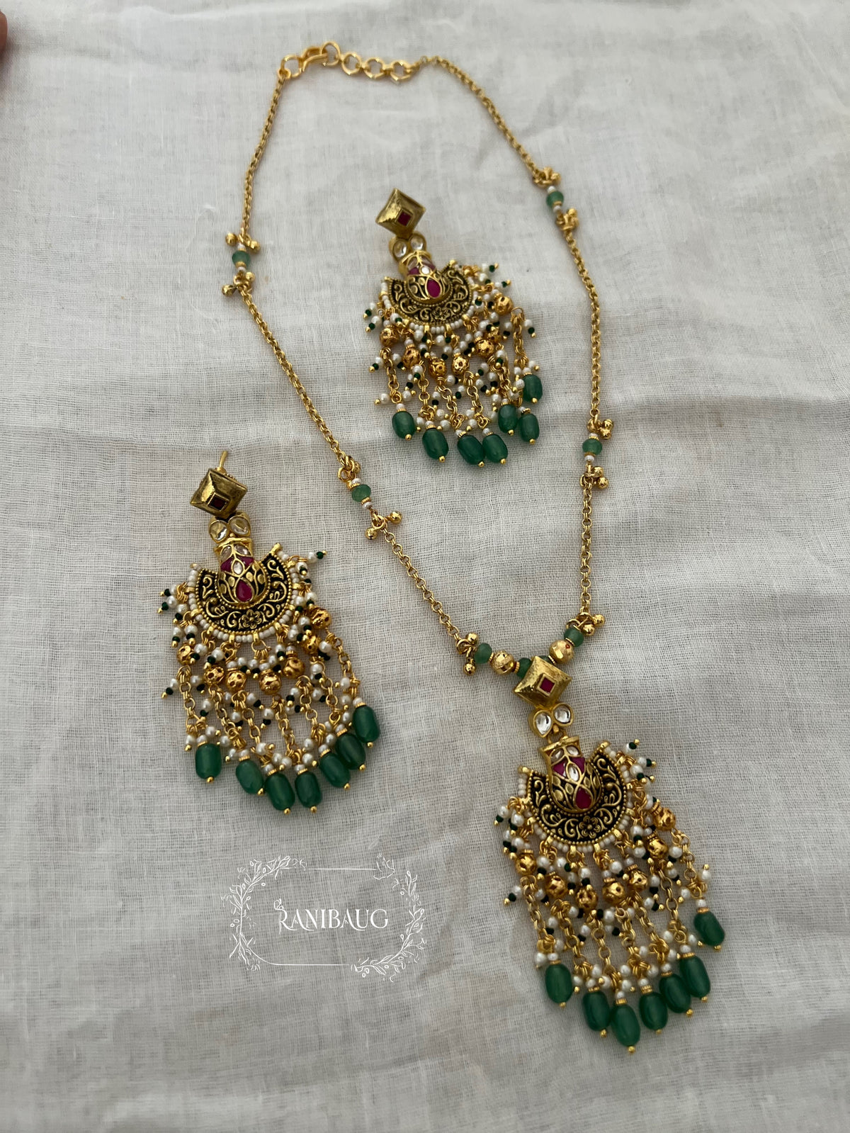 Miloni Gold Finish Green Beads Adorned Tassel Classic Heitage Necklace Set By Ranibaug