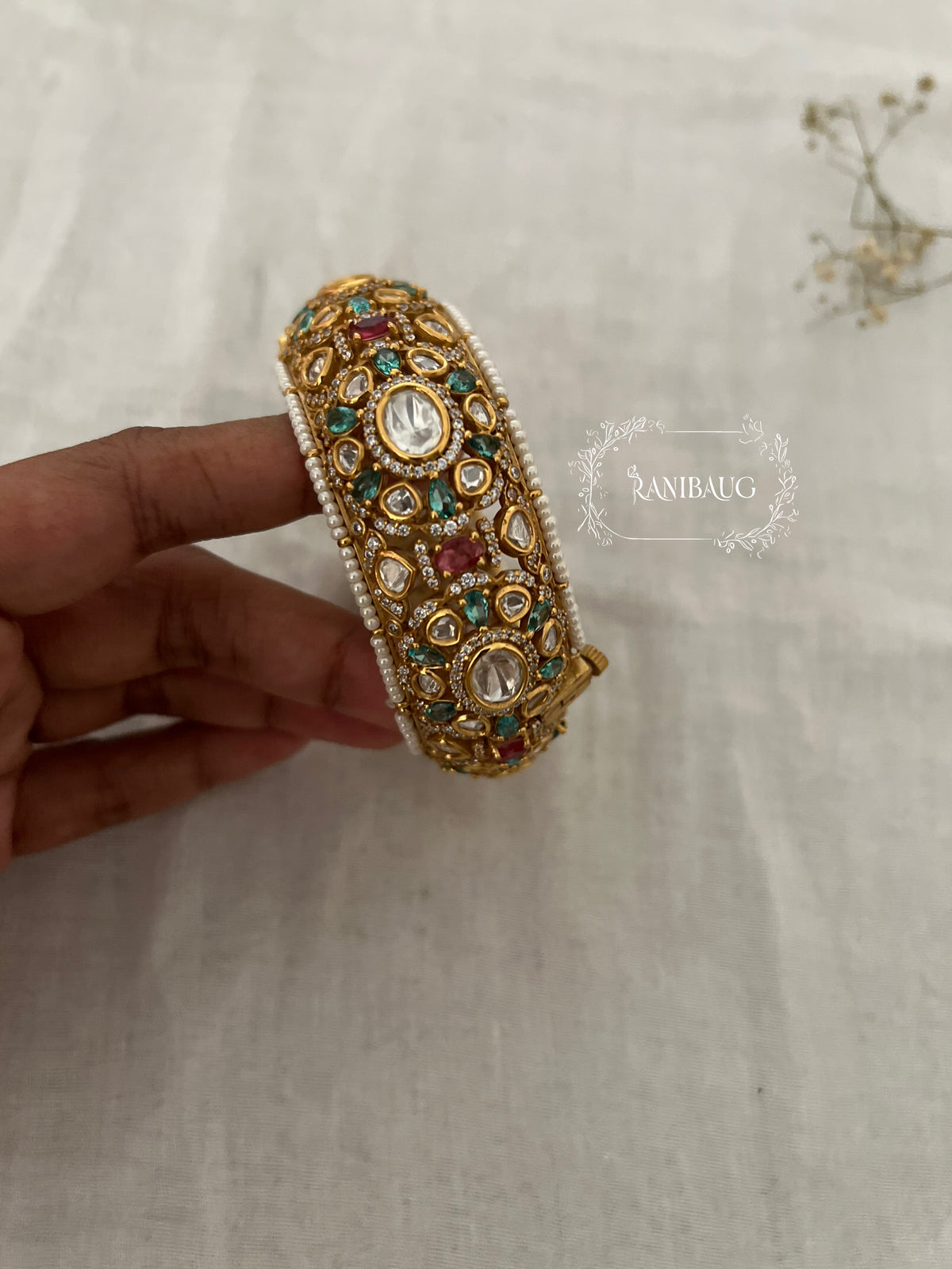 Miraya Royal Mint Pink Seed Pearl Kundan Gold Finish Bangle By Ranibaug