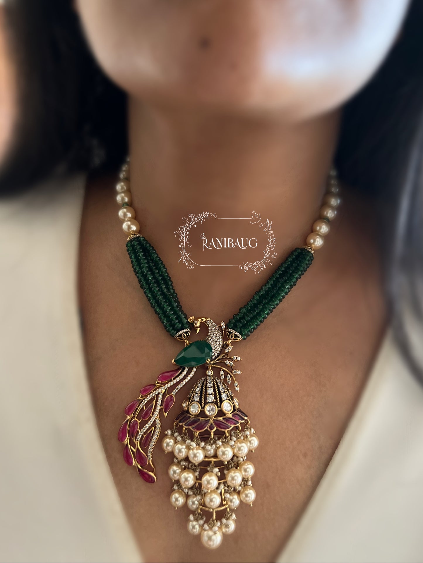 Mishka Royal Peacock Polki Pearl Adorned Necklace Jewellery Set with Ear Chain By Ranibaug