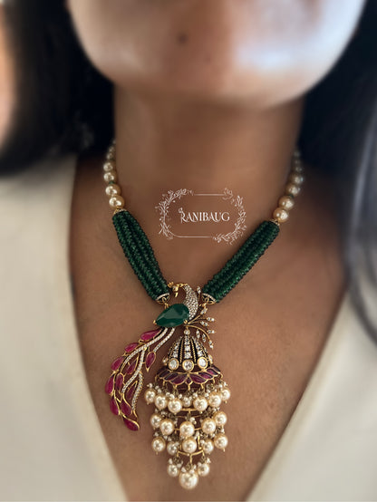 Mishka Royal Peacock Polki Pearl Adorned Necklace Jewellery Set with Ear Chain By Ranibaug