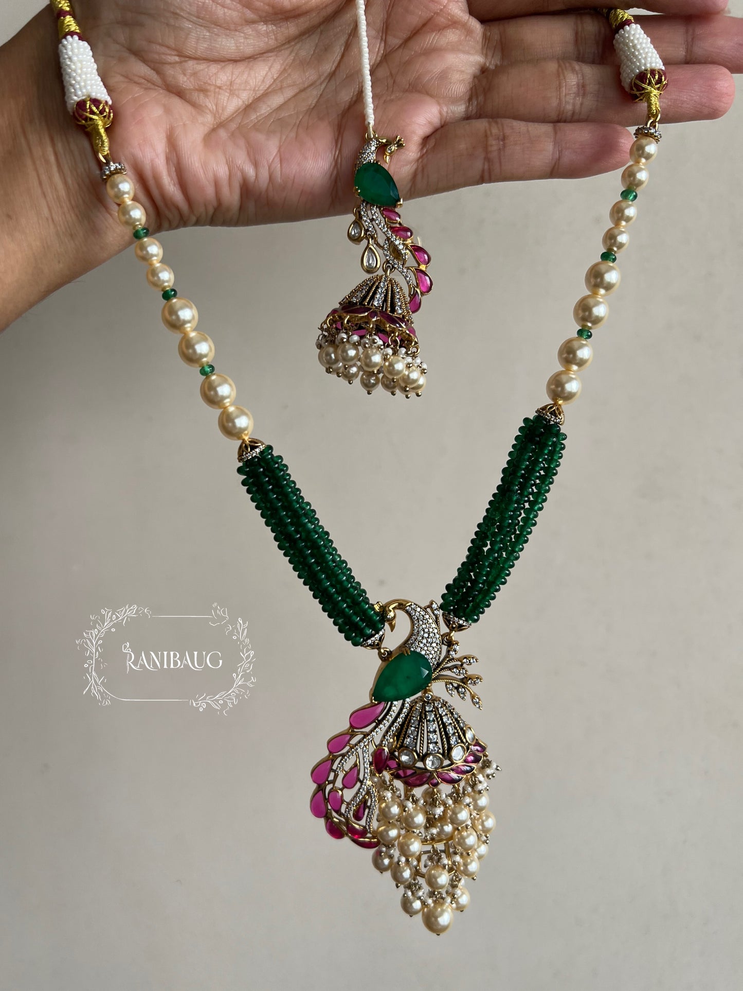 Mishka Royal Peacock Polki Pearl Adorned Necklace Jewellery Set with Ear Chain By Ranibaug