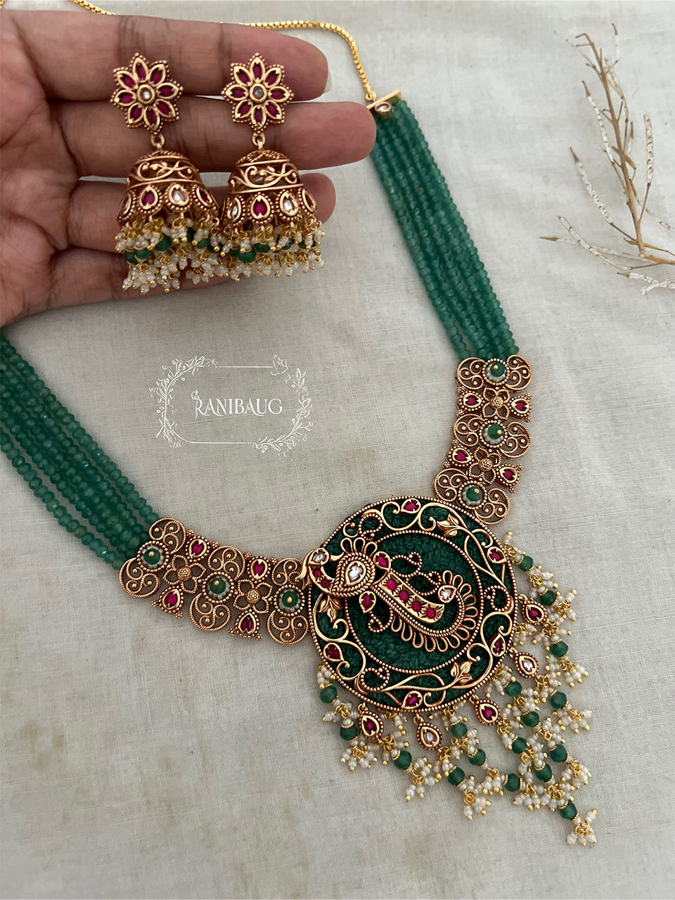 Mor Heritage Set In Peacock Motif And Dangling Fringes In Rich Gold Finish By Ranibaug