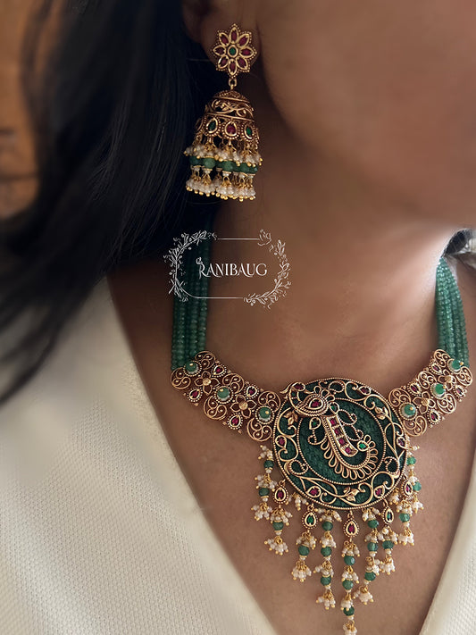 Mor Heritage Set In Peacock Motif And Dangling Fringes In Rich Gold Finish By Ranibaug