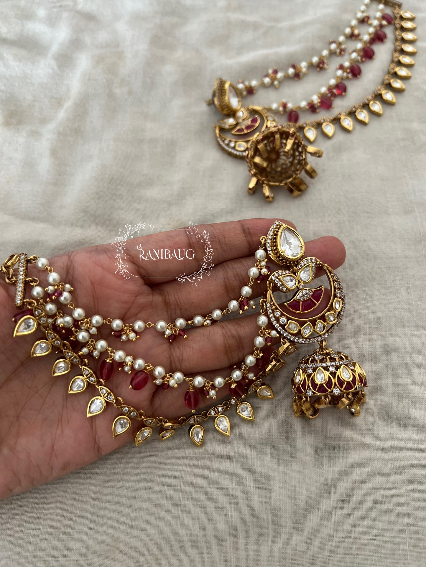Mughda Gold Plated Kundan Studded Chandbali Jhumka With Hair Chain By Ranibaug | Prettiest Wedding Jewelry Collection 2026