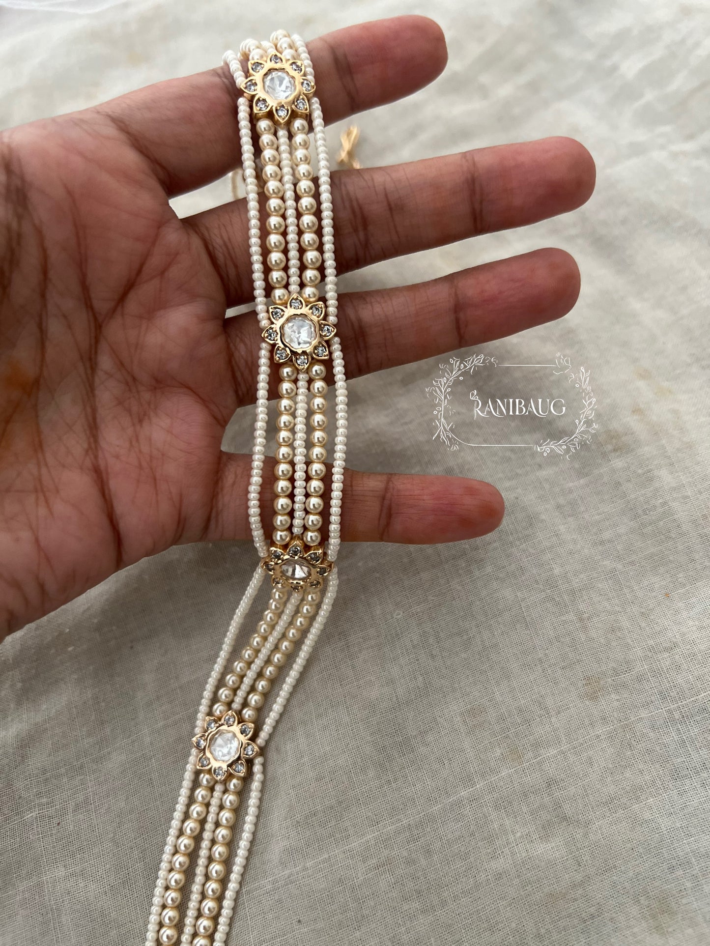Namya Polki Floral Sheeshpatti With Layered Pearl And Bead Strands In Premium Gold Finish By Ranibaug