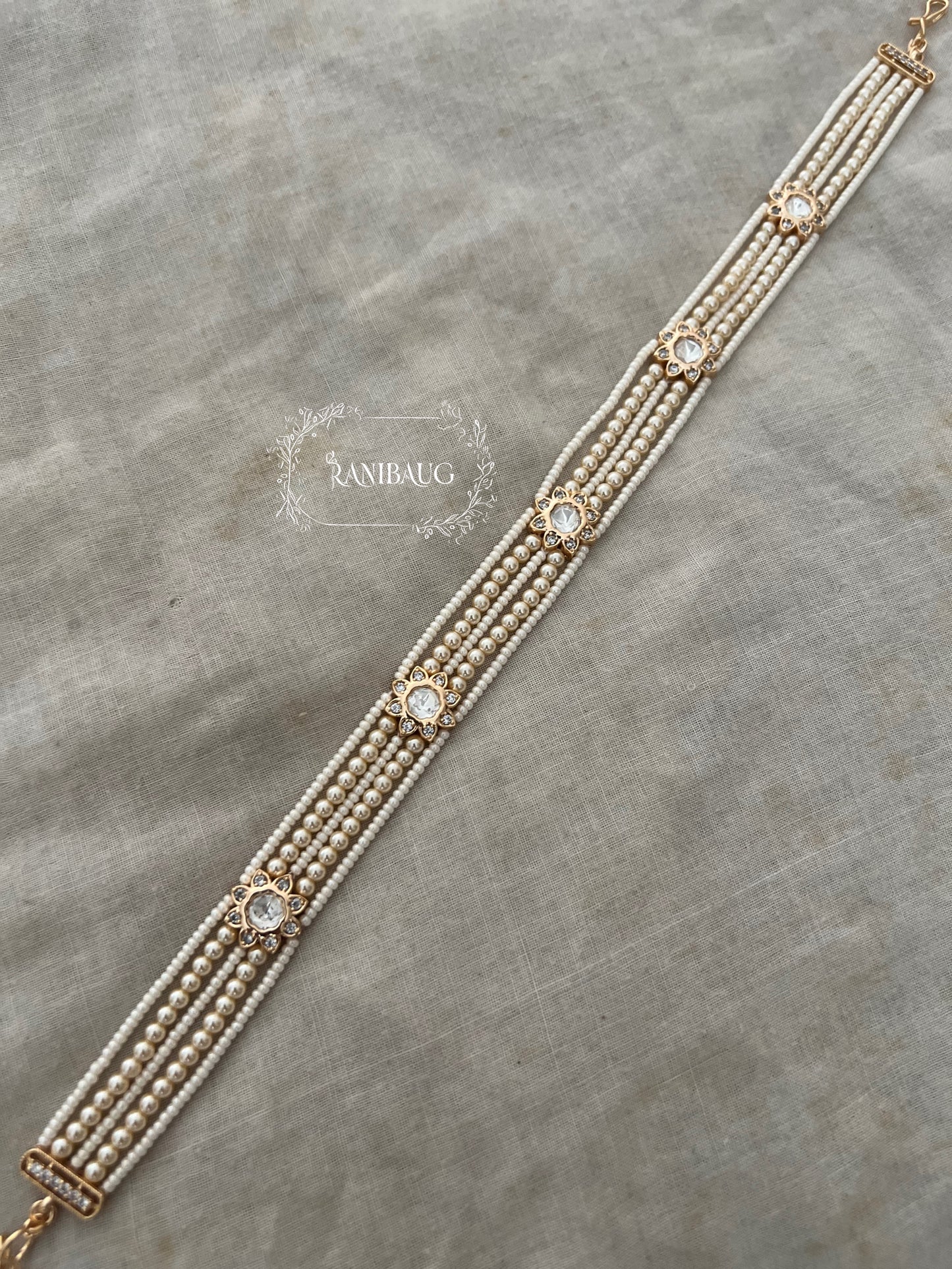 Namya Polki Floral Sheeshpatti With Layered Pearl And Bead Strands In Premium Gold Finish By Ranibaug